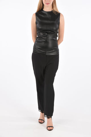 Top Smanicato con Zip Posteriore