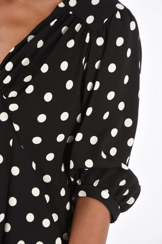 vestito a pois scollo a v con manica bombata