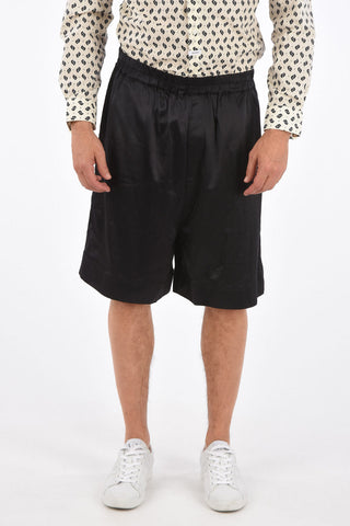 shorts in seta con coulisse in vita