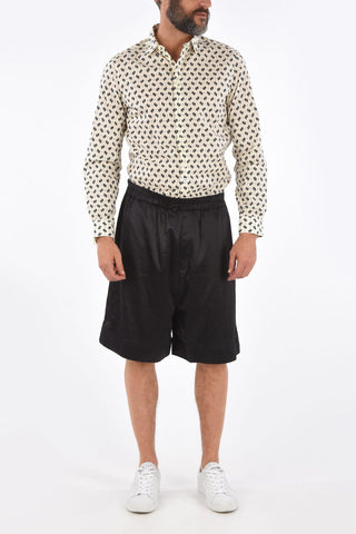 shorts in seta con coulisse in vita