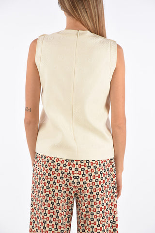 Golden buttons top with zip back closure