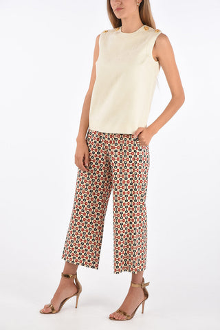Golden buttons top with zip back closure