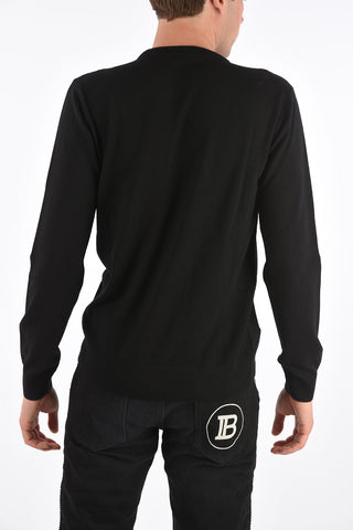 maglia girocollo in lana con ricamo