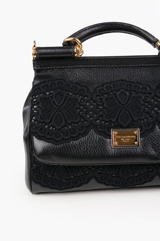 Bauletto in pelle con ricamo crochet