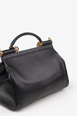 Bauletto in pelle con ricamo crochet