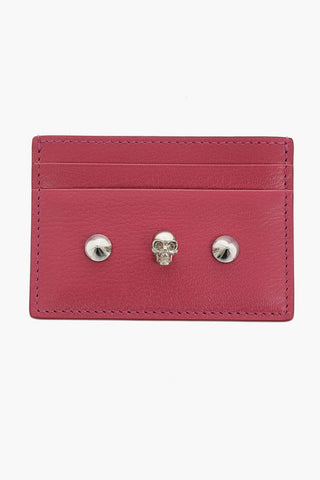 portacarte in pelle con borchie