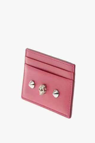 portacarte in pelle con borchie