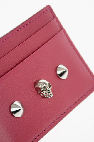 portacarte in pelle con borchie