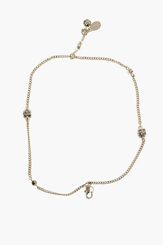metal bracelet with skull charm