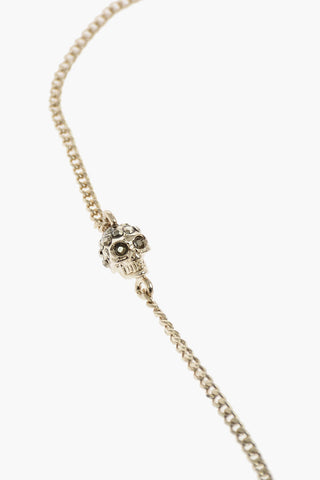metal bracelet with skull charm