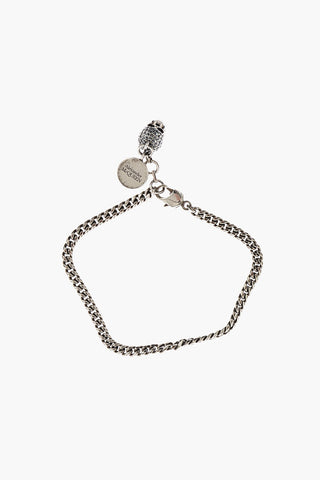metal bracelet with skull charm