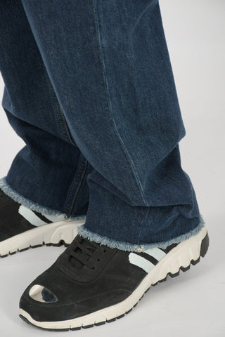 Jeans Wide Cut con Orlo Sfrangiato