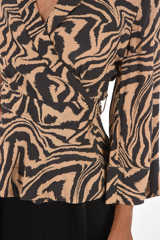 zebra-print wrap blouse
